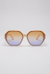 Haven oversized sunglasses in cream Coconut Cream frame with amber-to-blue gradient lenses, front view on a light-grey backdrop