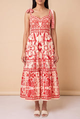 Front view of the For Another Time Maxi Dress: red and cream scroll print, sweetheart neckline, tie straps and a tiered skirt that falls to the lower calf.