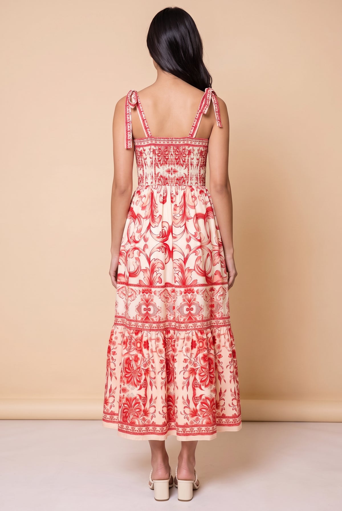 Back view of the For Another Time Maxi Dress showing the smocked back panel and the tie strap bows.