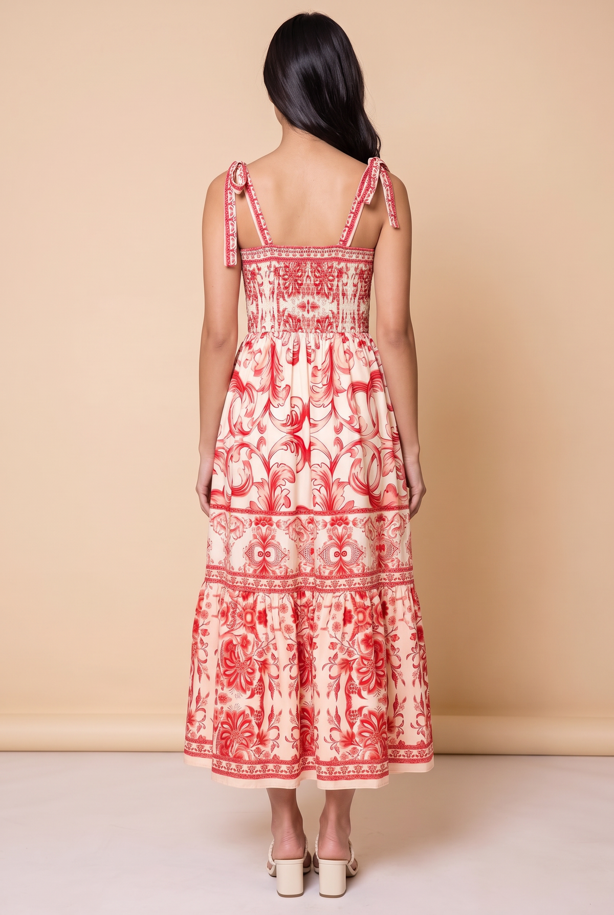 Back view of the For Another Time Maxi Dress showing the smocked back panel and the tie strap bows.
