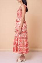 Side view of the For Another Time Maxi Dress showing the A-line tiered skirt and lower calf length.