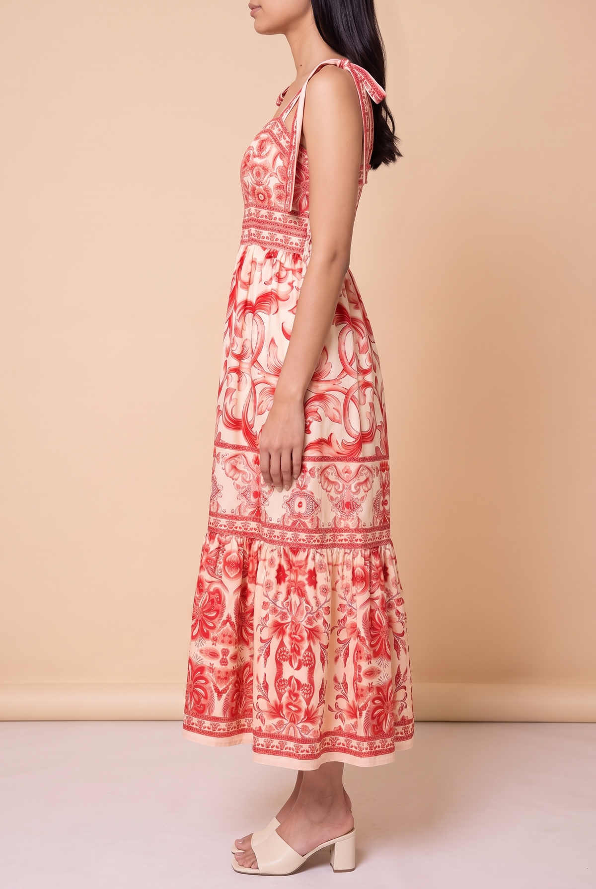Side view of the For Another Time Maxi Dress showing the A-line tiered skirt and lower calf length.