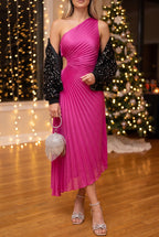 Fuchsia pleated one-shoulder midi dress worn with a black sequin bomber, rhinestone bow sandals and a rhinestone ball bag at a holiday party.