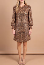 Front view of the Going Wild leopard sequin shift dress with bronze satin neckline and smocked cuffs