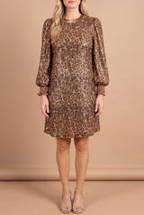 Front view of the Going Wild leopard sequin shift dress with bronze satin neckline and smocked cuffs