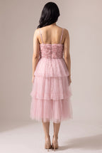Back of the Kiss From a Rose Midi Dress showing the rosette bodice, center back zip, thin straps and three tulle tiers.
