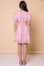 Back view of the Forget Me Not Paisley Dress showing the printed border panels and waistband.