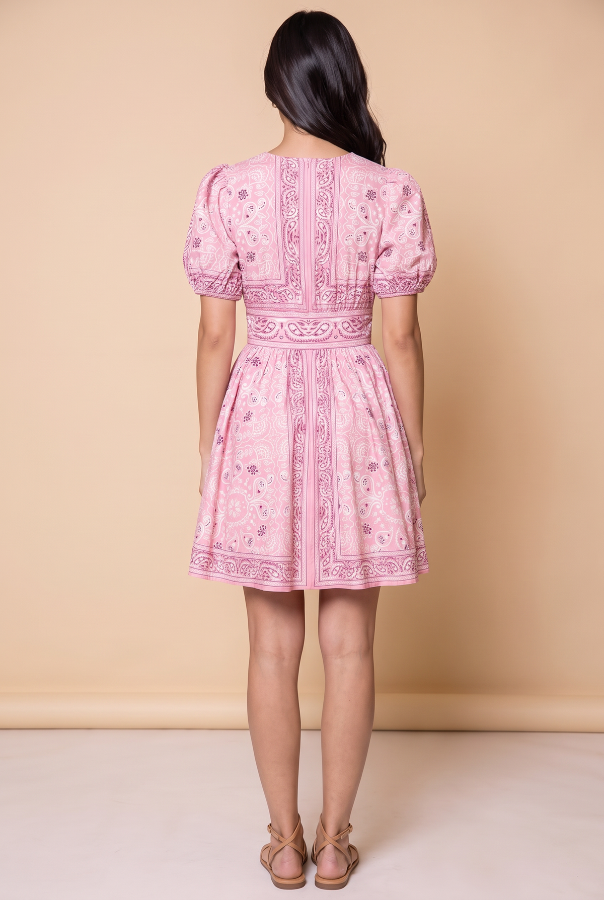 Back view of the Forget Me Not Paisley Dress showing the printed border panels and waistband.