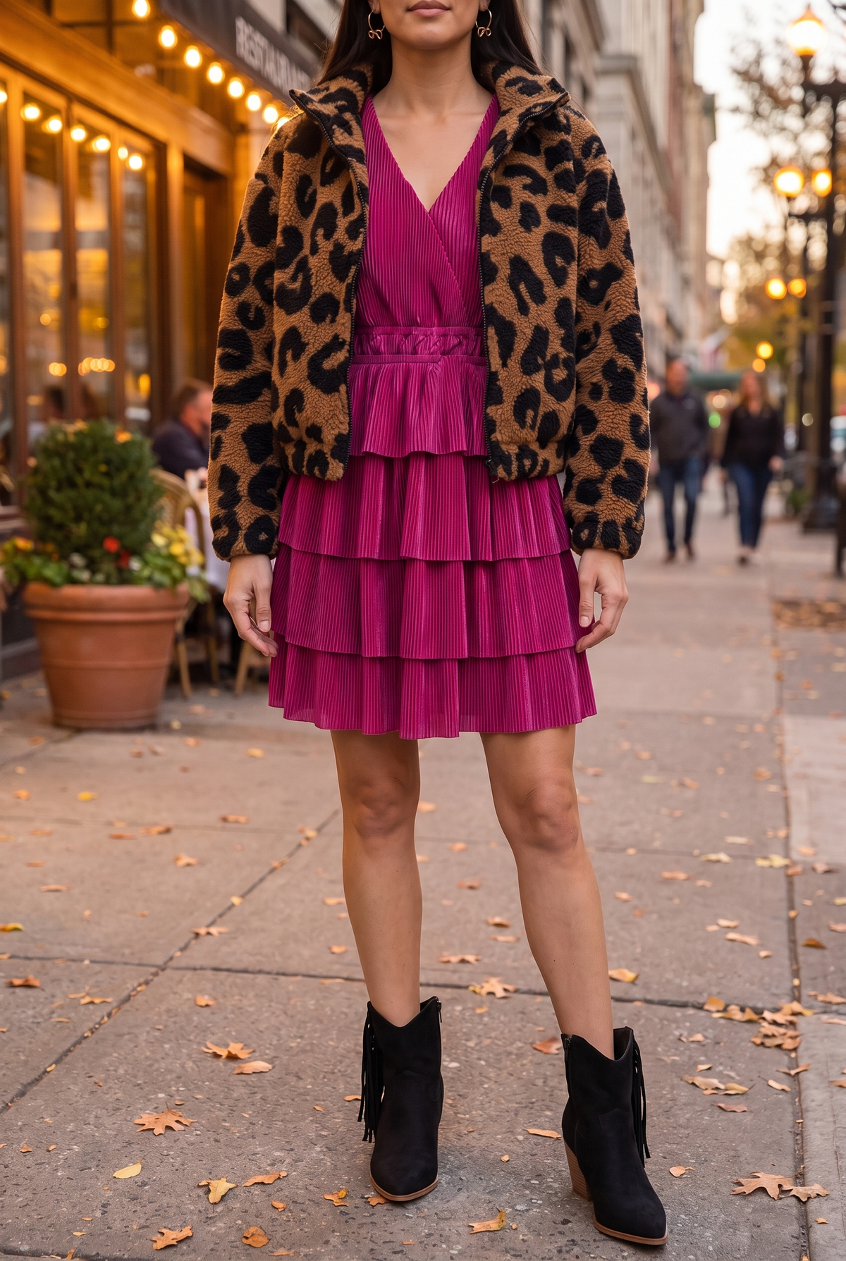 The magenta tiered dress on an autumn evening with a leopard faux sherpa jacket, black fringe western ankle boots and gold bow hoop earrings.