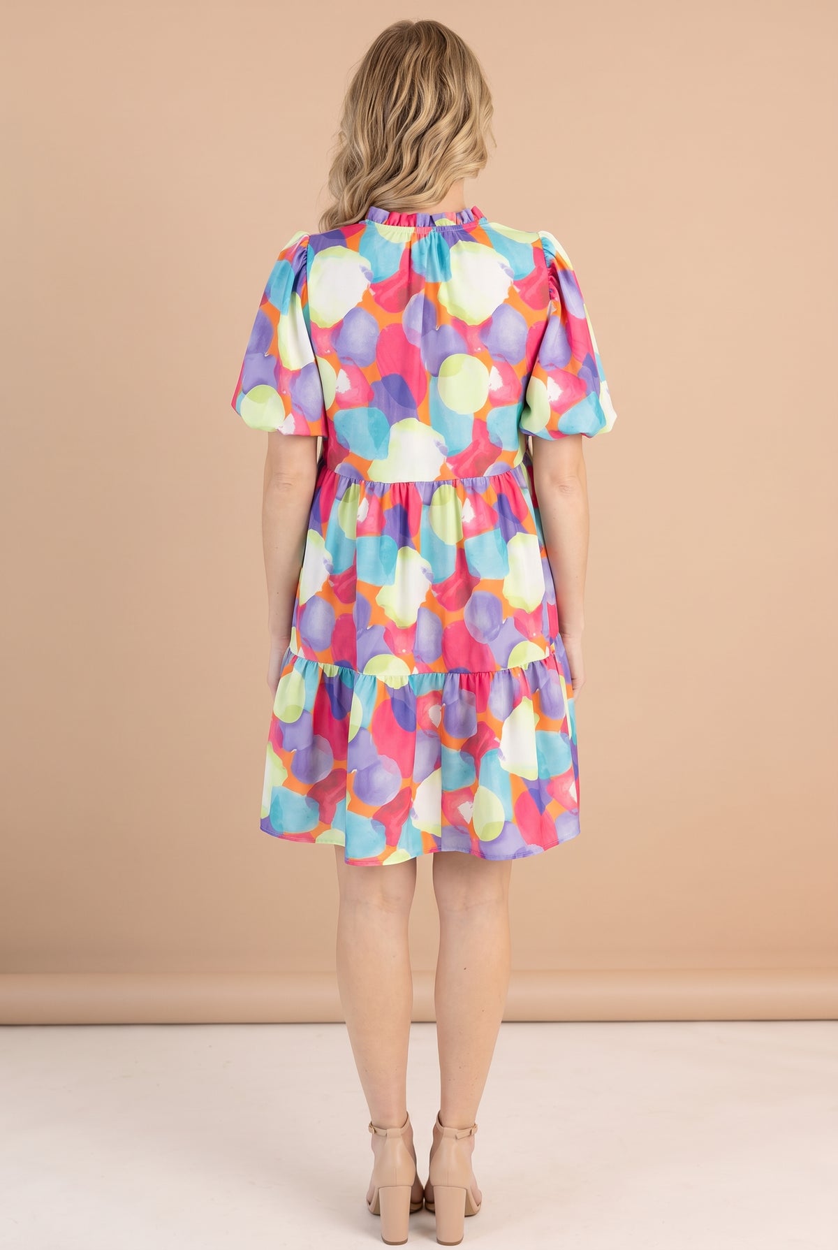 Back of the Crush On You watercolor print babydoll dress with ruffled collar and puff sleeves.