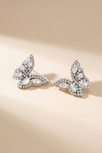June Butterfly Earrings in White: half-butterfly studs with clear and opal marquise stones and clear rhinestone borders