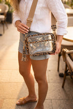 Joanna Cross Body Camera Bag in Leopard worn crossbody: leopard trim and tassel, khaki strap with leopard tabs