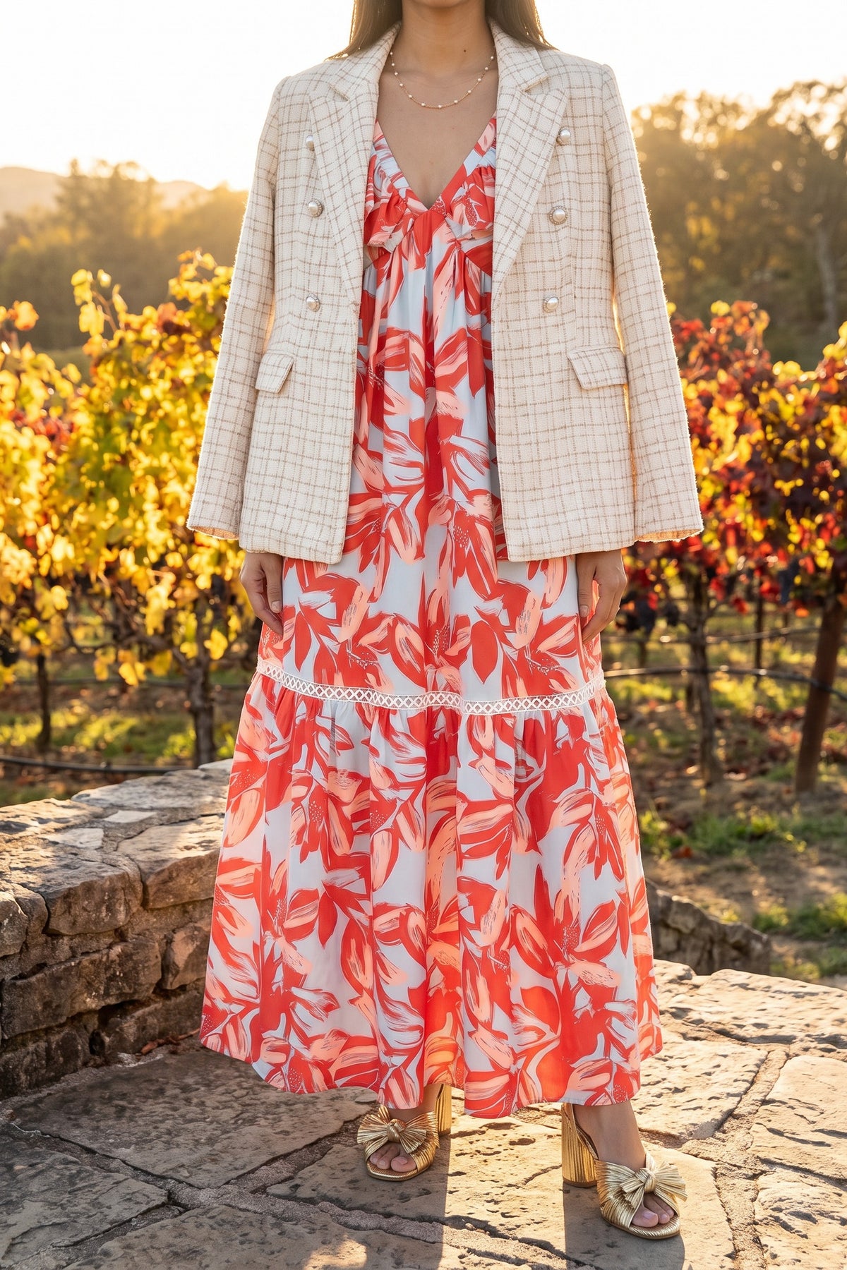 Painted The Sky floral maxi dress styled for fall with the Make It Happen Blazer, Avery Bow Sandals and Kate Chain Pearl Necklace at a vineyard.