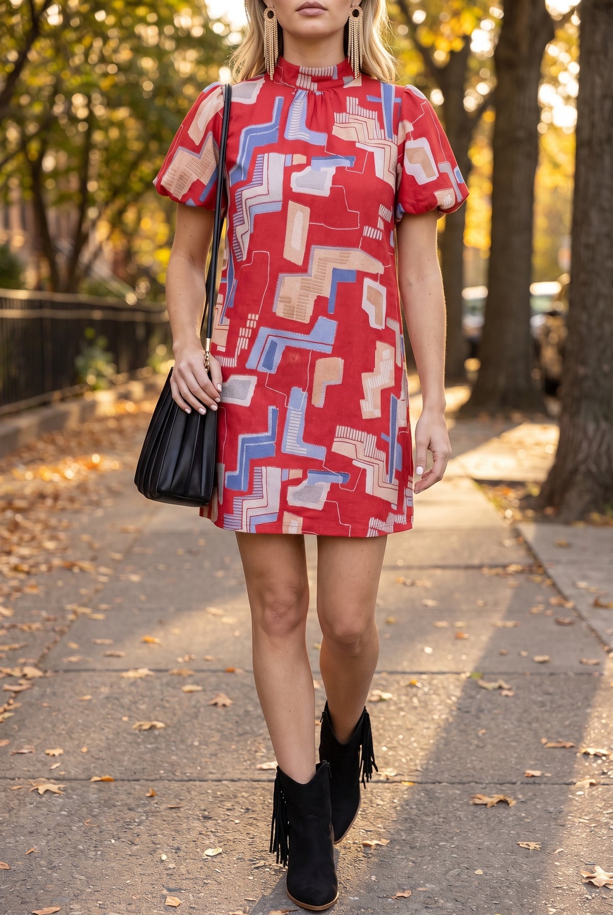 Bold Statement Bubble Sleeve Tie Back Dress styled for fall with Dixie fringe ankle boots, the Carrie pleated shoulder bag and Nancy fringe earrings