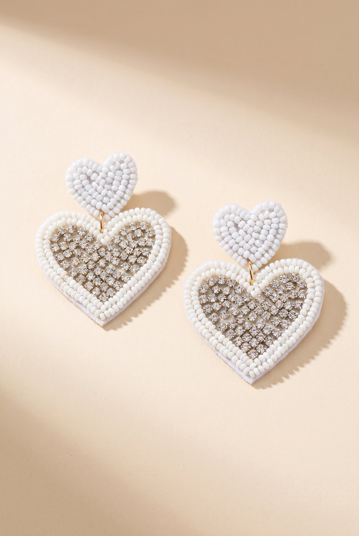 Loveleen Heart Earrings, White still life