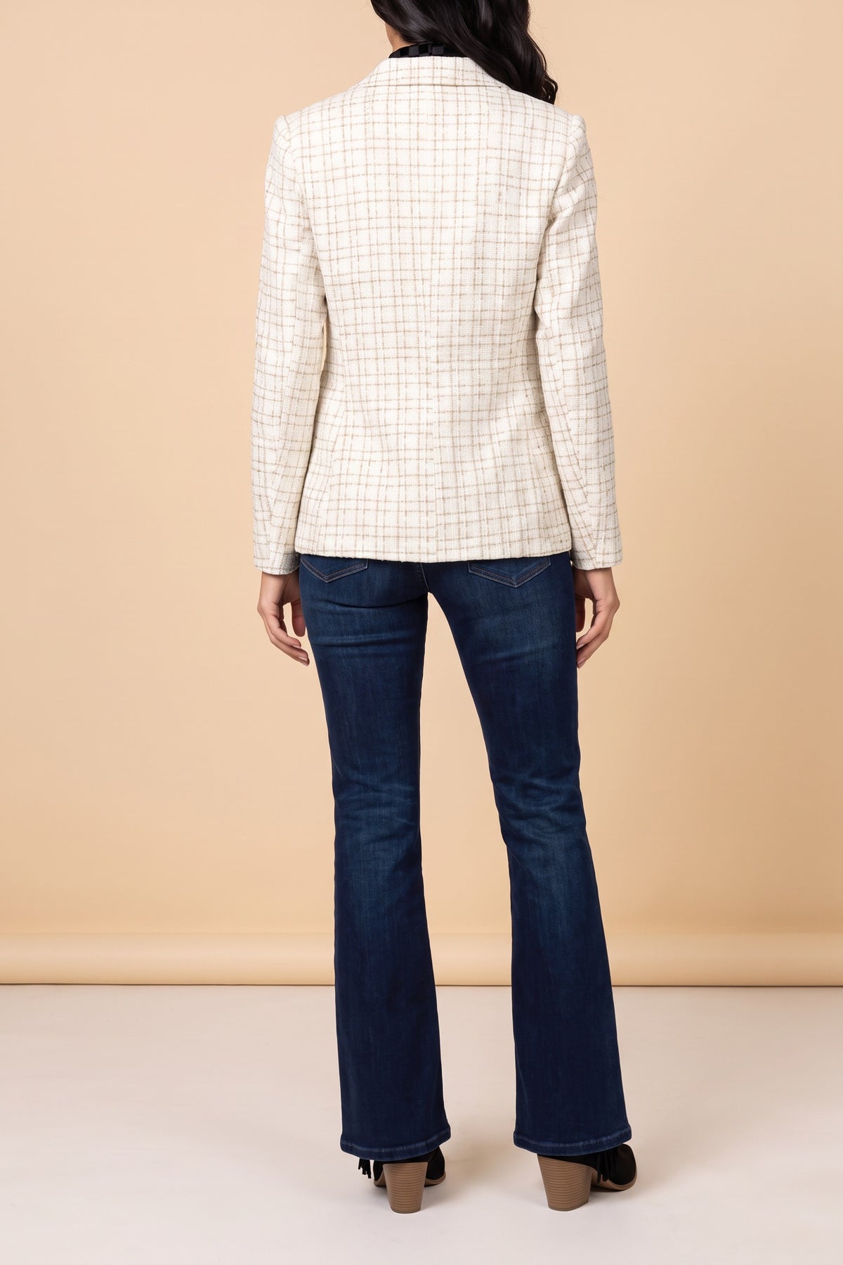 Back view of the Make It Happen cream tweed blazer, showing the hip length and the gold grid check.