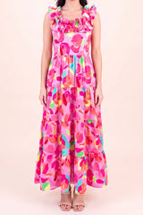 Front view of the Blooming Affair floral maxi dress showing the ruffled straps and neckline, smocked bodice and three tiers falling to the ankle.