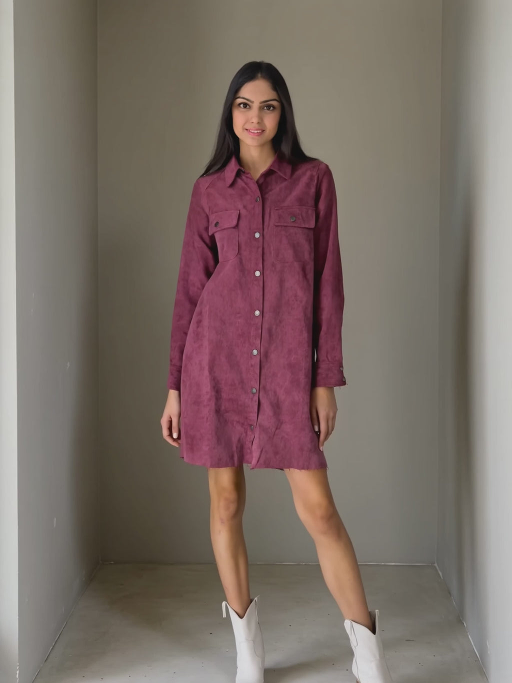 Shweta walking in the Part Of My Story corduroy shirt dress to show its drape and hem movement.