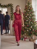 I’m Yours Jumpsuit worn by Sofia at a holiday party, stepping forward and turning to show the back and the fit.