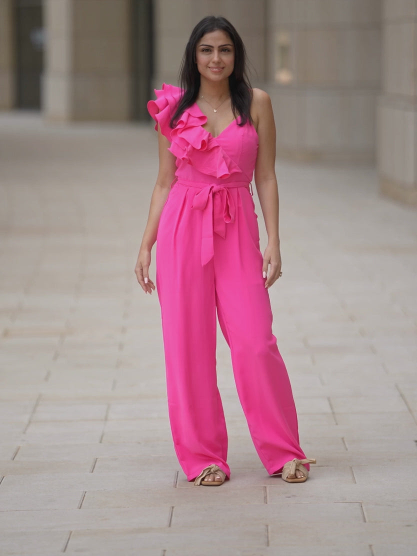 Made You Look Ruffle Shoulder Jumpsuit in motion on Shweta, showing the wide-leg drape while walking.