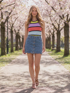 Calm Down Striped Tank Top worn by Sofia at a blossoming park, stepping forward and turning to show the back and the fit.