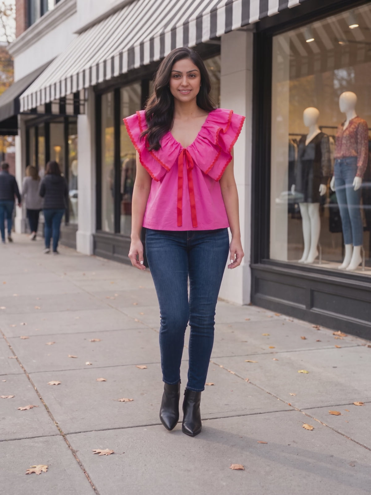 It Needs Passion Pink Ruffle Babydoll Top worn by Shweta at a boutique shopping street, stepping forward and turning to show the back and the fit.