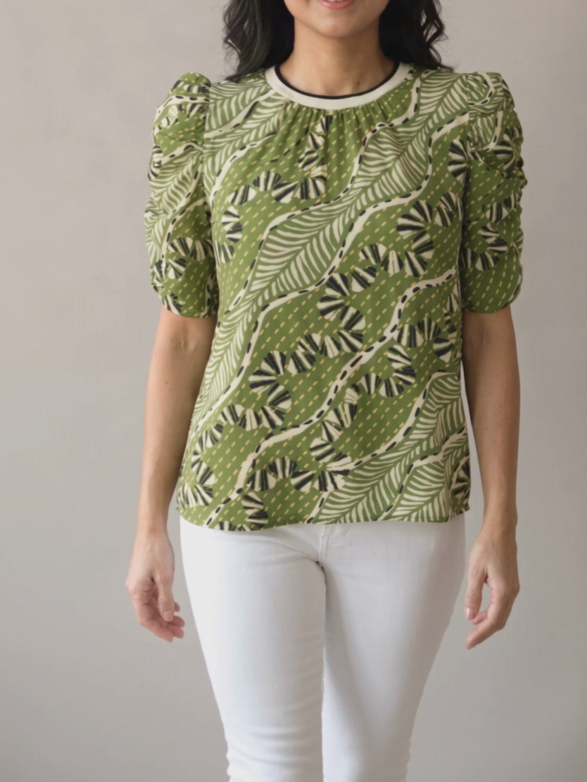 Young Wild and Free Puff Sleeve Top in Small moving through a gentle step and quarter-turn.
