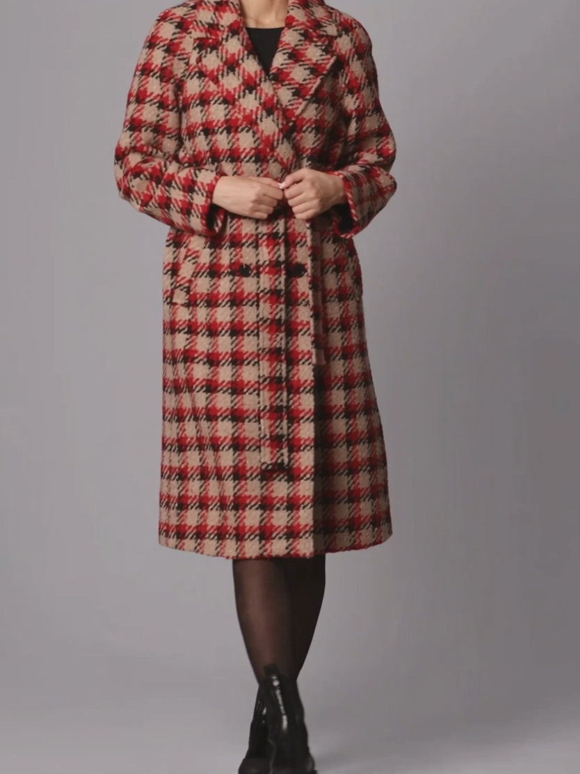 Plaid belted coat in Small moving from front to side, showing its drape and hem swing.