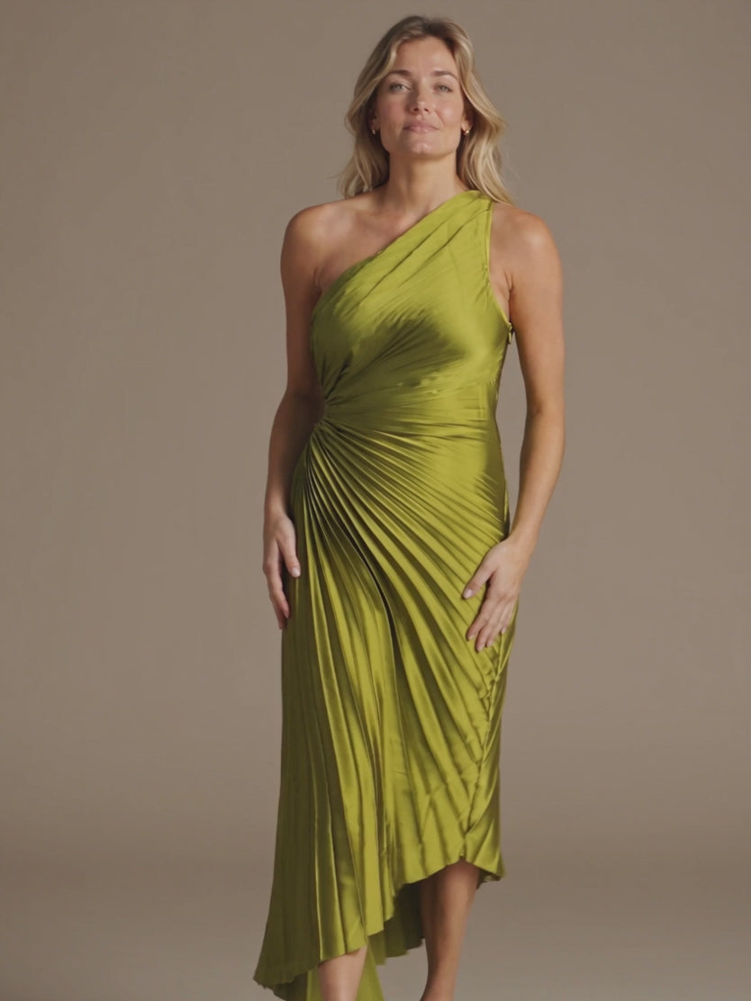 Crazy for You Pleated Maxi Dress moving on Elsa, showing the pleated skirt sway and asymmetric hem.