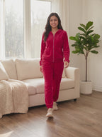 Don't You Want Me Faux Fur Hoodie Jacket and Pants Set worn by Shweta at a cozy living room, stepping forward and turning to show the back and the fit.