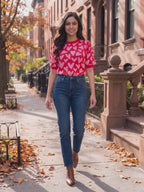 Love Knows All Puff Sleeve Sweater Top worn by Shweta at an autumn city street, stepping forward and turning to show the back and the fit.