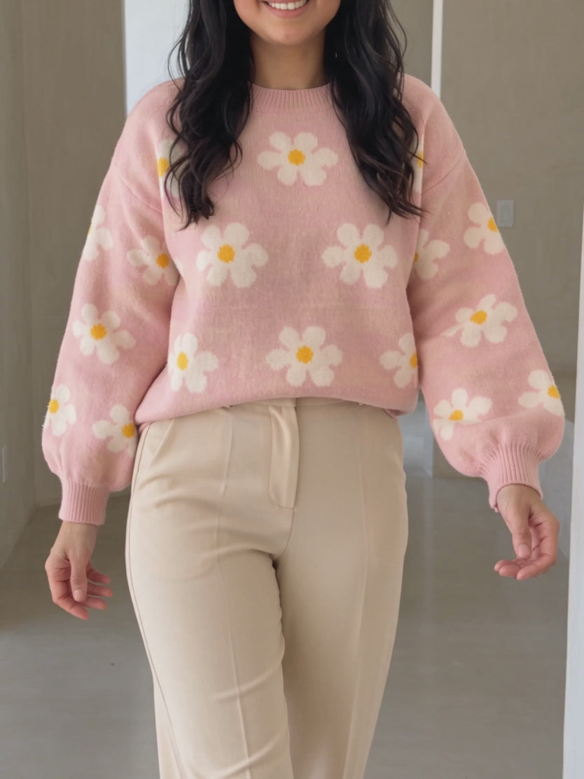 Let's Just Stay Floral Sweater worn while walking, showing gentle movement through the hem and balloon sleeves.