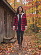 Cozy Cabin Buffalo Plaid Shacket worn by Shweta at a forest cabin in autumn, stepping forward and turning to show the back and the fit.
