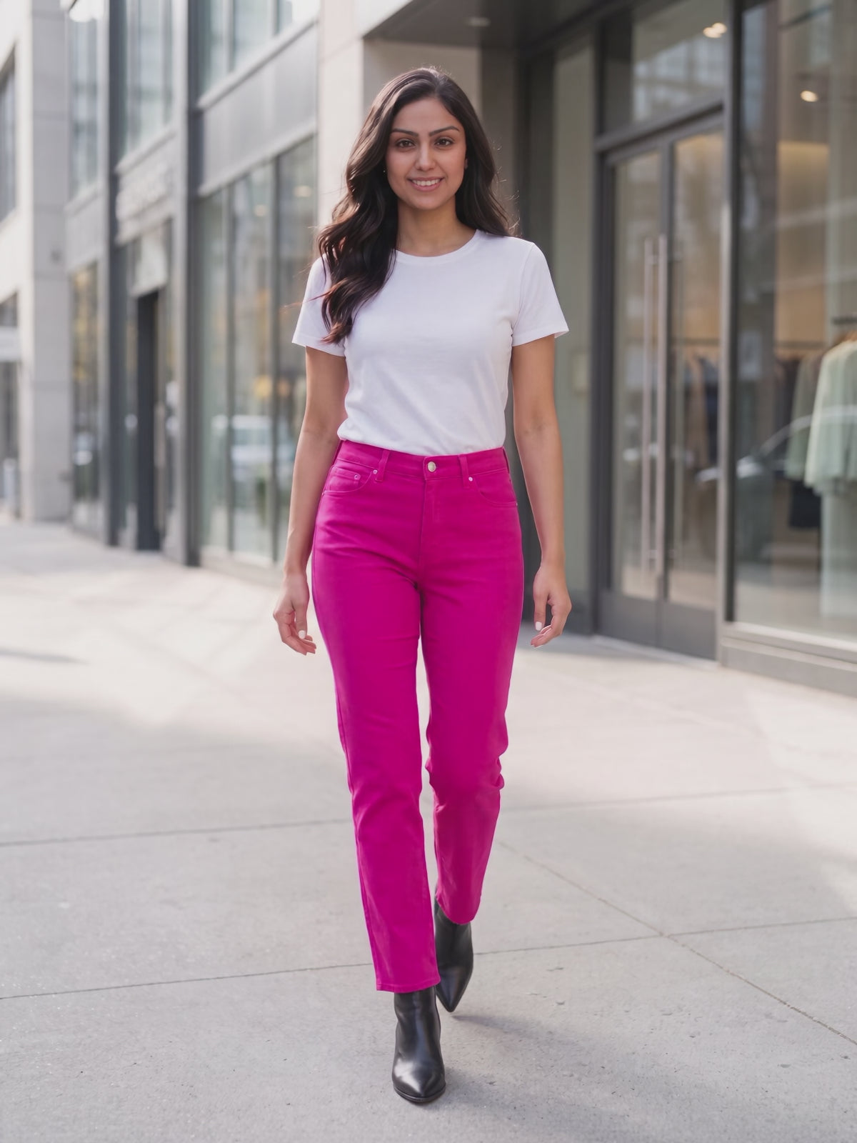 Bright Side High Rise Straight Pants worn by Shweta at a bright city street, stepping forward and turning to show the back and the fit.