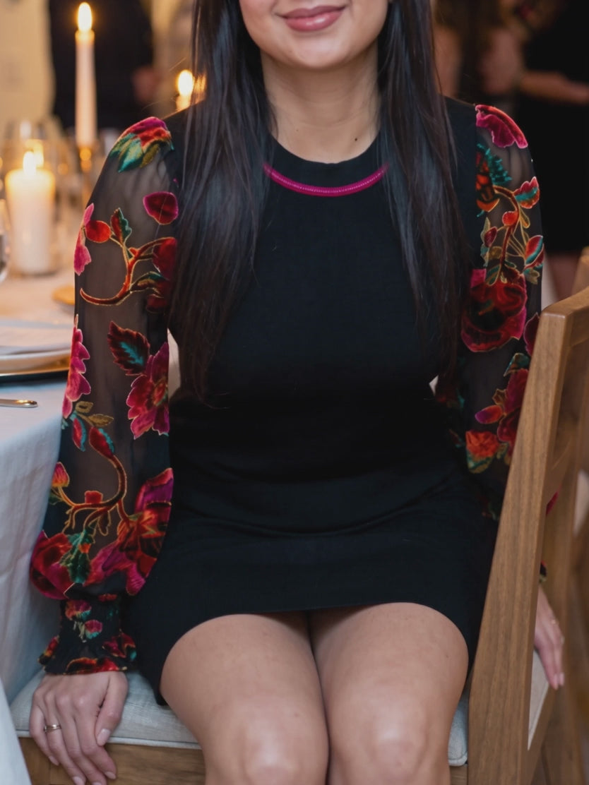You're My Favorite Sweater Dress moving from seated to standing, showing sleeve motion and hem behaviour.