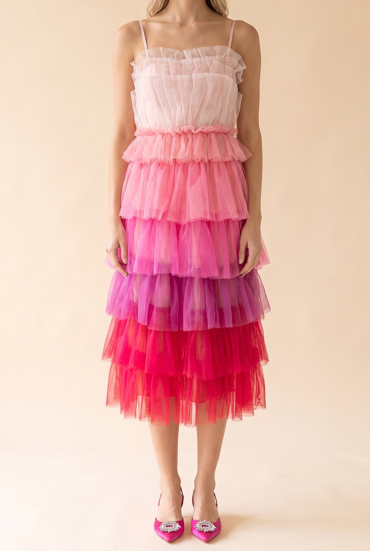 Front view of the Wildest Dreams pink ombre tiered tulle midi dress with thin straps and a ruffled blush bodice